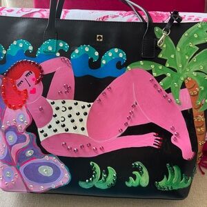 Unique hand painted leather bag.